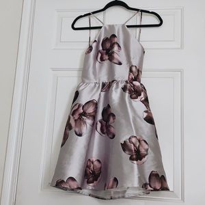 Lulus Backless dress with pockets.